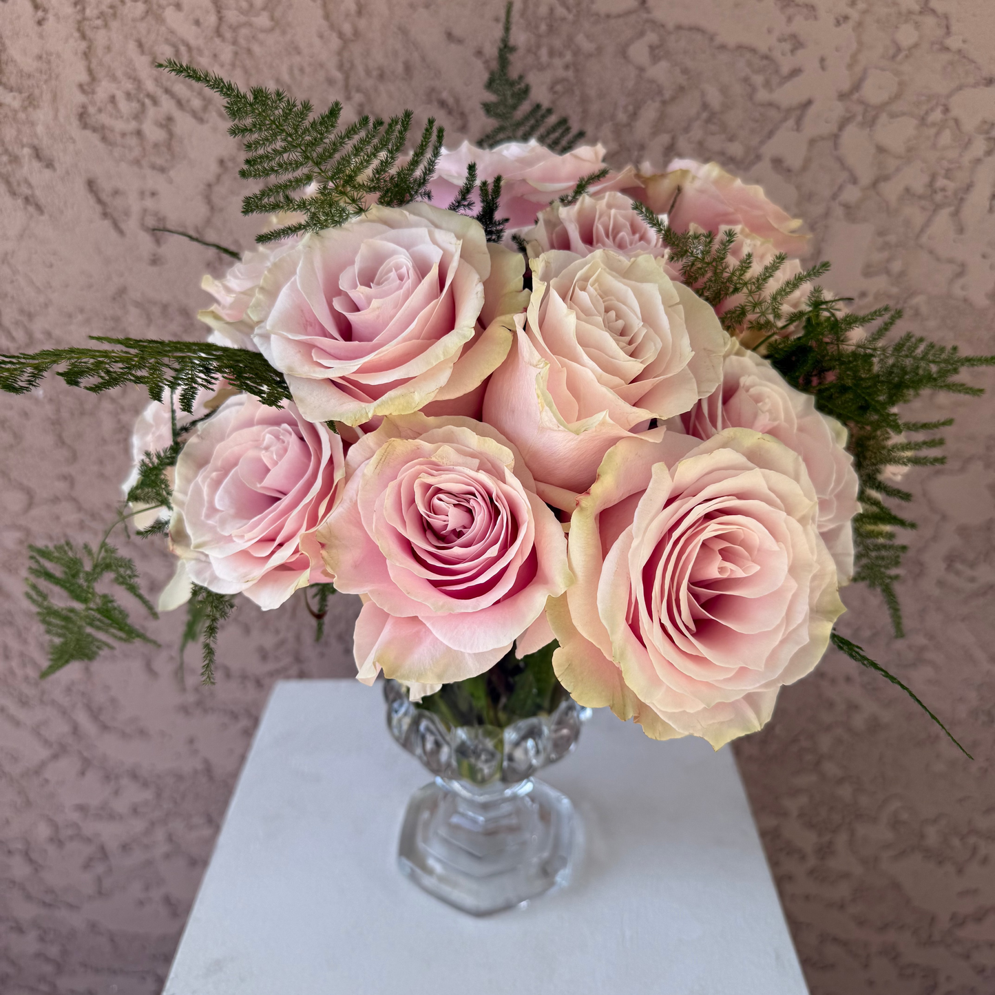 Pink Roses in glass vase.