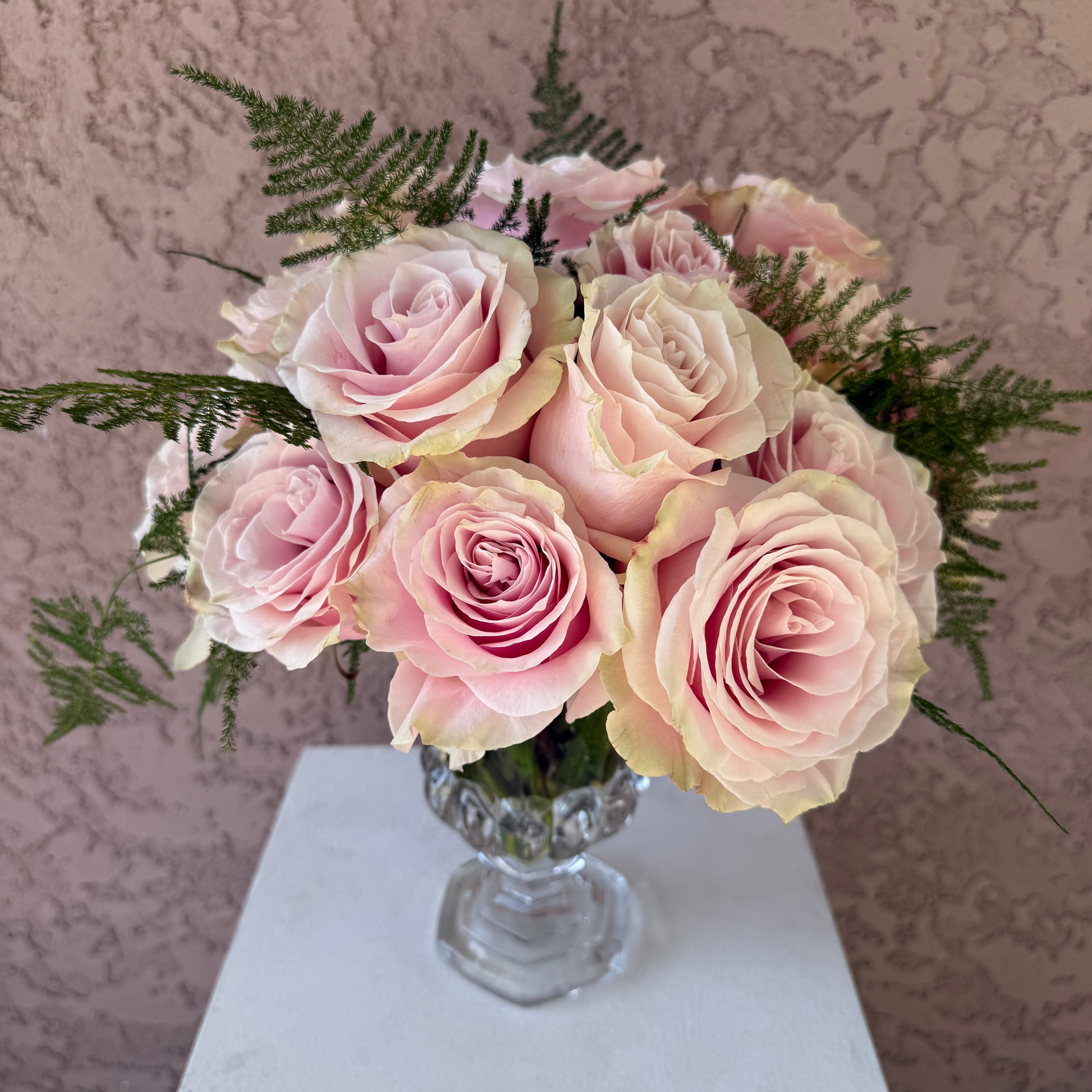 Pink Roses in glass vase.